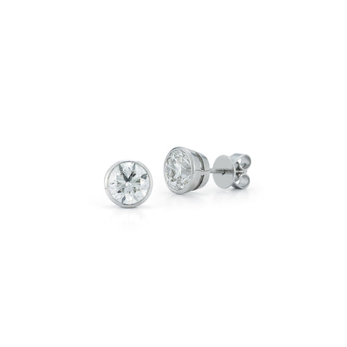 White Gold-4^Diamond Stud Earrings - DRD Diamond Solitaire Studs 2.00 Ct. Total Weight in White Gold. Bezel Setting