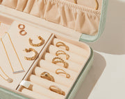 14k gold and diamond jewelry in a velvet box