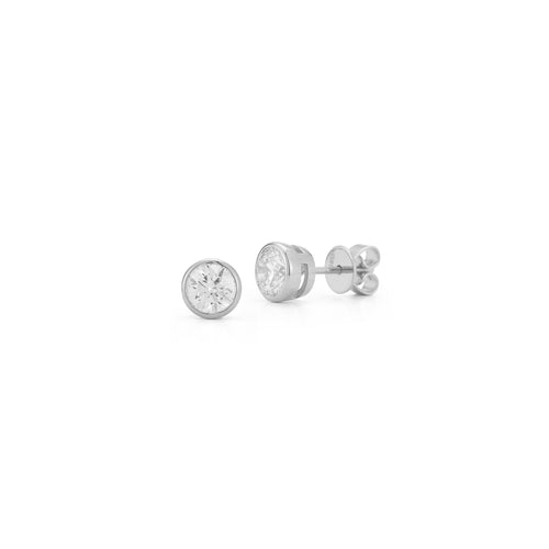 White Gold-4^Diamond Stud Earrings - DRD Diamond Solitaire Studs 1.00 Ct. Total Weight in White Gold. Bezel Setting
