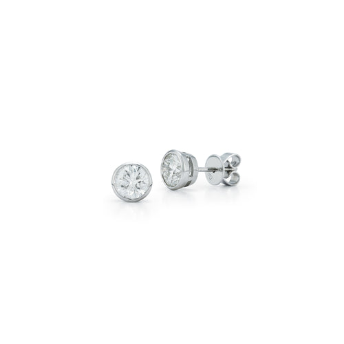 White Gold-4^Diamond Stud Earrings - DRD Diamond Solitaire Studs 1.40 Ct. Total Weight in White Gold. Bezel Setting