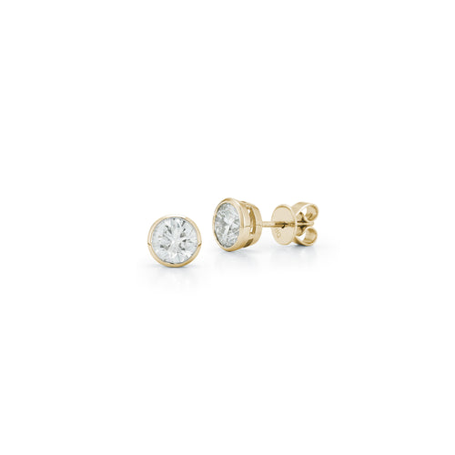 Yellow Gold-4^Diamond Stud Earrings - DRD Diamond Solitaire Studs 1.40 Ct. Total Weight in Yellow Gold. Bezel Setting