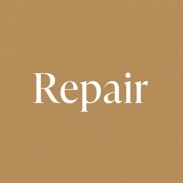 The word 'Repair' in white serif lettering centered on a solid warm tan background.