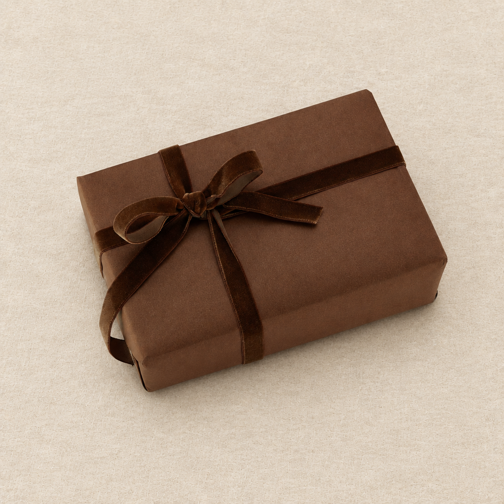 Brown gift wrapping on a warm textured background