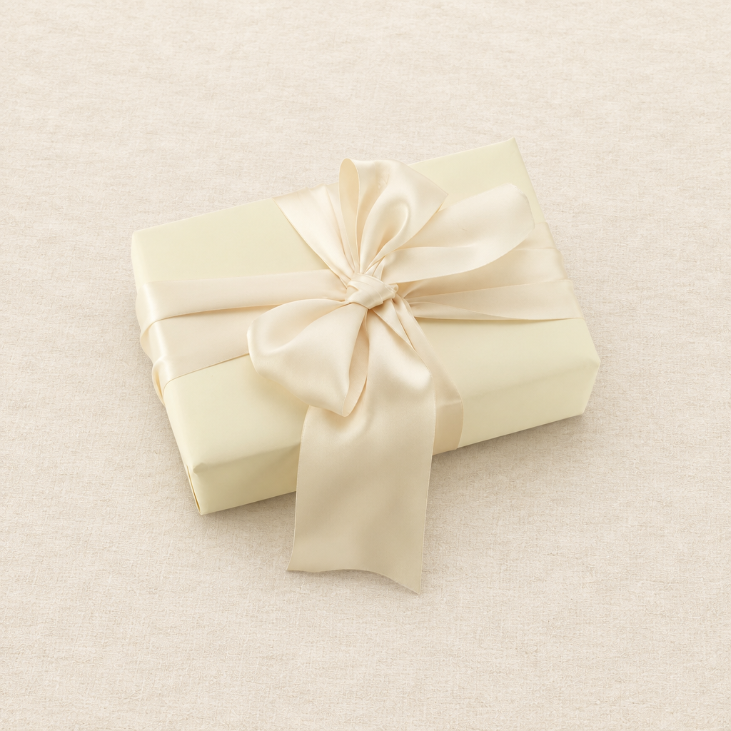 Ivory gift on a neutral textured background