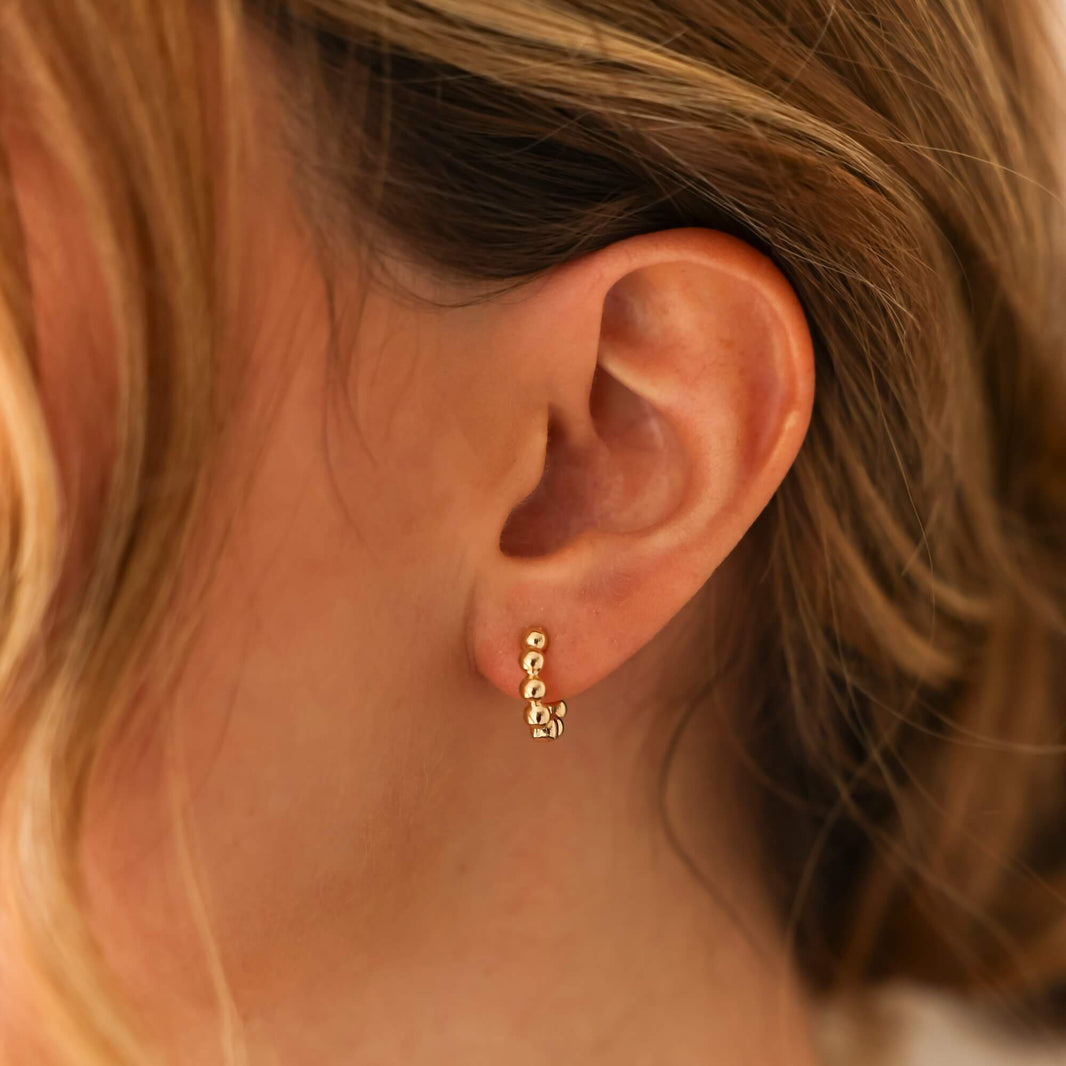 Yellow Gold-2^Diamond Huggie Earrings: Poppy Rae Pebble Hoops in Yellow Gold Thumbnail-only